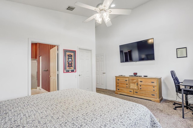 257 NW Toscane Trl, Port Saint Lucie, FL 34986 - carpeted bedroom with a high ceiling, baseboards, and a ceiling fan