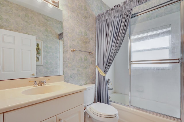 257 NW Toscane Trl, Port Saint Lucie, FL 34986 - full bathroom with wallpapered walls, bath / shower combo with glass door, toilet, and vanity