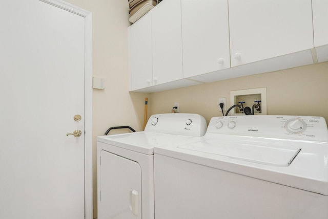 257 NW Toscane Trl, Port Saint Lucie, FL 34986 - washroom featuring independent washer and dryer and cabinet space