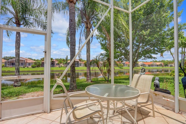 257 NW Toscane Trl, Port Saint Lucie, FL 34986 - sunroom / solarium featuring a water view and a residential view