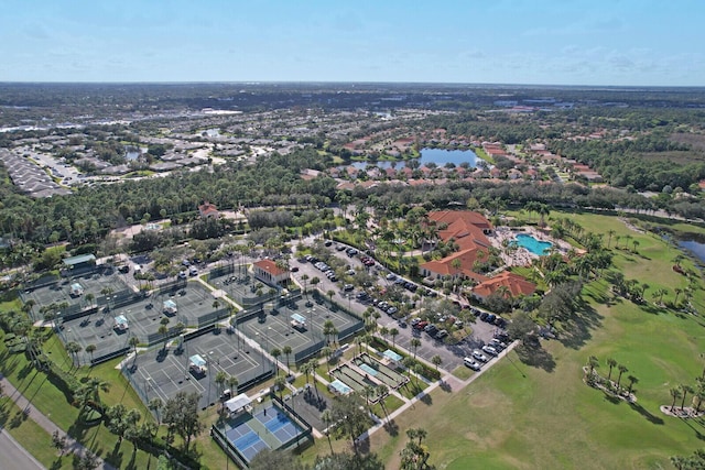 257 NW Toscane Trl, Port Saint Lucie, FL 34986 - aerial view of property and surrounding area featuring a large body of water, a local golf course, and nearby suburban area