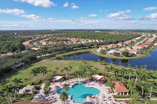 257 NW Toscane Trl, Port Saint Lucie, FL 34986 - aerial perspective of suburban area with a large body of water, a local golf course, and a pool area