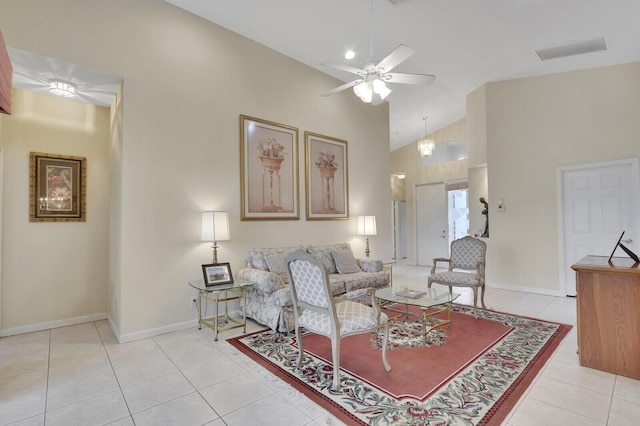 257 NW Toscane Trl, Port Saint Lucie, FL 34986 - living room with light tile patterned floors, ceiling fan, high vaulted ceiling, and baseboards