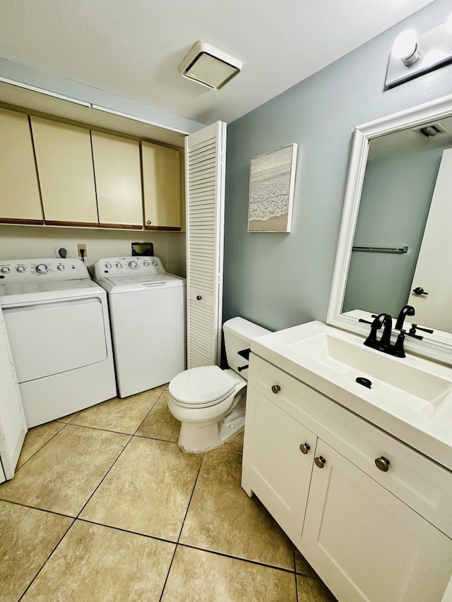 11887 SW 13th Ct, Davie, FL 33325 - bathroom with washer and dryer, vanity, toilet, and tile patterned flooring