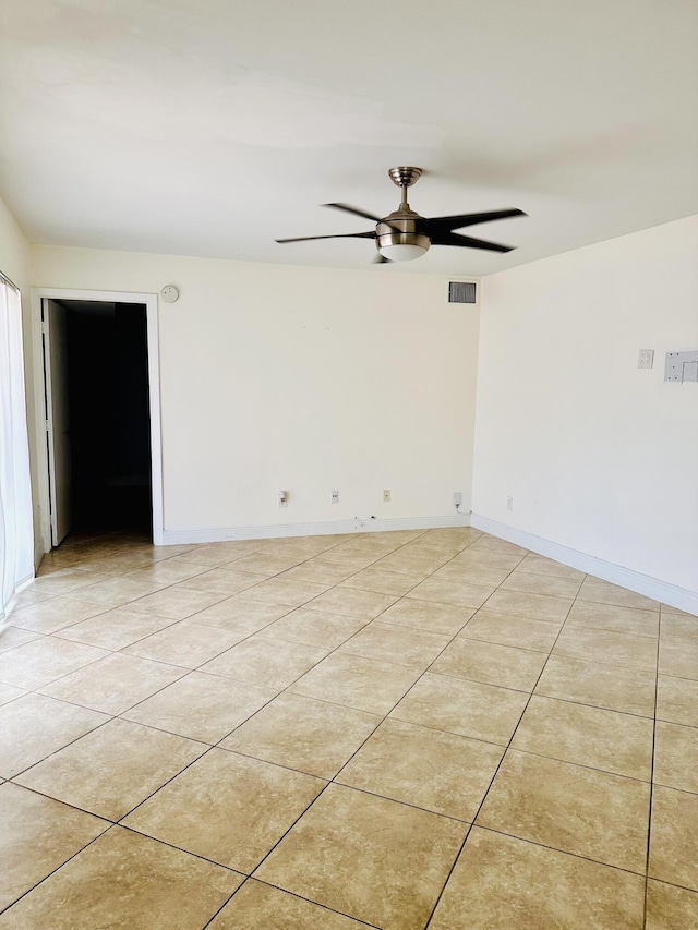 11887 SW 13th Ct, Davie, FL 33325 - empty room featuring a ceiling fan, light tile patterned floors, and baseboards