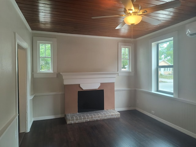 626 Texas Ct, Fort Pierce, FL 34950 - unfurnished living room with healthy amount of natural light, wainscoting, dark wood-type flooring, a brick fireplace, and a ceiling fan