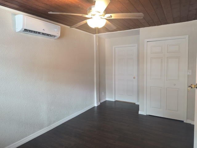 626 Texas Ct, Fort Pierce, FL 34950 - empty room featuring a wall mounted AC, wooden ceiling, a ceiling fan, dark wood-type flooring, and baseboards