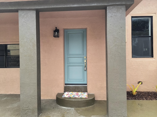 626 Texas Ct, Fort Pierce, FL 34950 - entrance to property featuring stucco siding