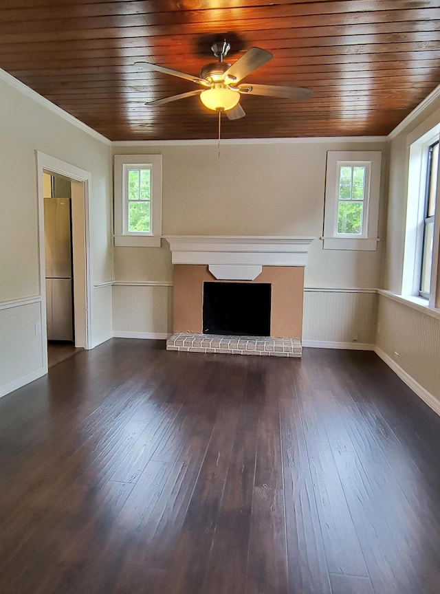 626 Texas Ct, Fort Pierce, FL 34950 - unfurnished living room with wood ceiling, a fireplace, a ceiling fan, dark wood finished floors, and ornamental molding