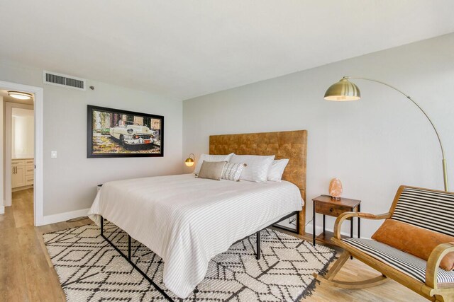 9650 S Ocean Dr Unit 1604, Jensen Beach, FL 34957 - bedroom with wood finished floors and baseboards