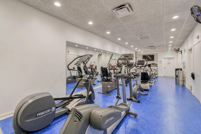 9650 S Ocean Dr Unit 1604, Jensen Beach, FL 34957 - exercise room featuring recessed lighting, a paneled ceiling, and baseboards