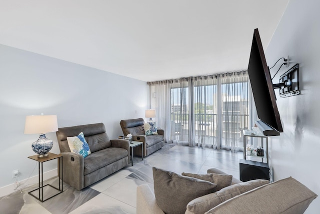 12 Royal Palm Way Unit 605, Boca Raton, FL 33432 - tiled living room featuring baseboards