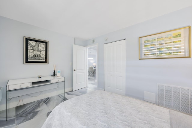 12 Royal Palm Way Unit 605, Boca Raton, FL 33432 - bedroom featuring marble finish flooring, a closet, and a desk