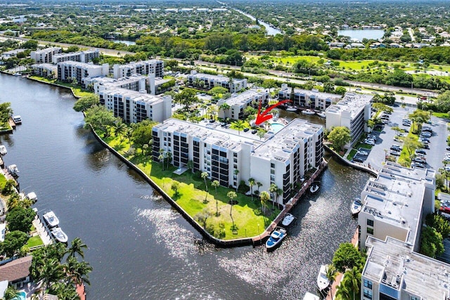 12 Royal Palm Way Unit 605, Boca Raton, FL 33432 - drone / aerial view of a nearby body of water, apartment complex / building, and a tree filled landscape