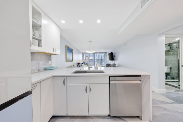 12 Royal Palm Way Unit 605, Boca Raton, FL 33432 - kitchen featuring dishwasher, a sink, a peninsula, white cabinets, and light countertops