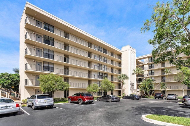 12 Royal Palm Way Unit 605, Boca Raton, FL 33432 - view of apartment building / complex with uncovered parking