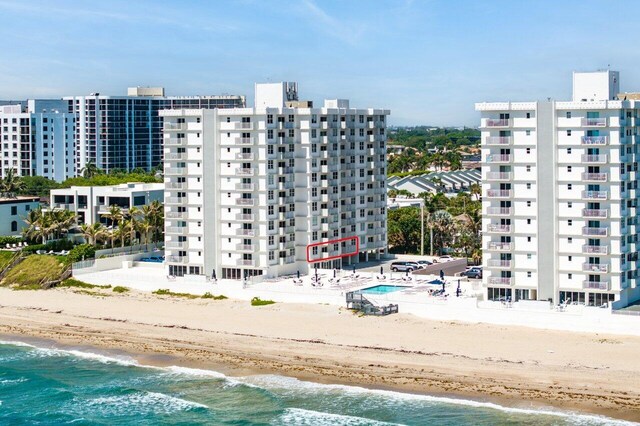 4511 S Ocean Blvd Unit 106, Highland Beach, FL 33487 - view of apartment building / complex featuring view of water and beach