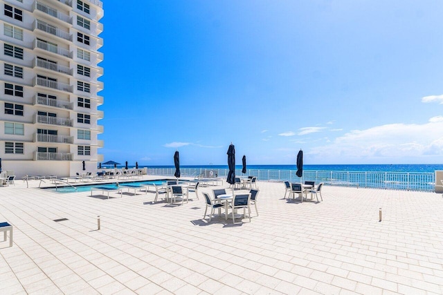4511 S Ocean Blvd Unit 106, Highland Beach, FL 33487 - community pool featuring a water view
