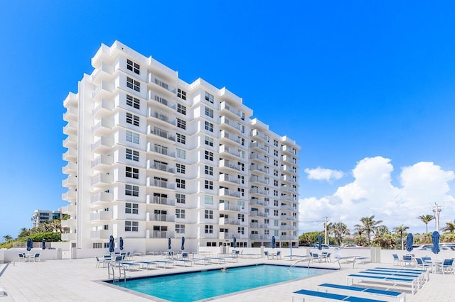 4511 S Ocean Blvd Unit 106, Highland Beach, FL 33487 - community pool with a patio area