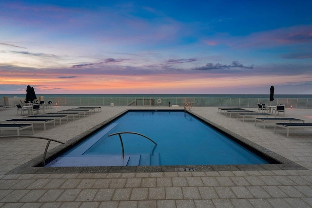 4511 S Ocean Blvd Unit 106, Highland Beach, FL 33487 - community pool featuring a patio area and a water view