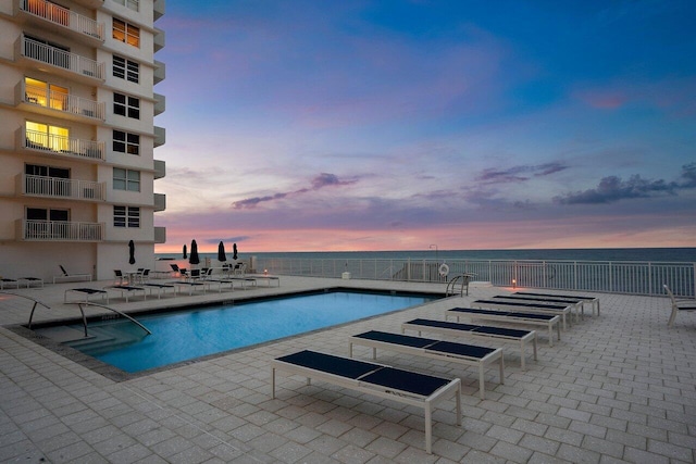 4511 S Ocean Blvd Unit 106, Highland Beach, FL 33487 - community pool featuring a patio and a water view