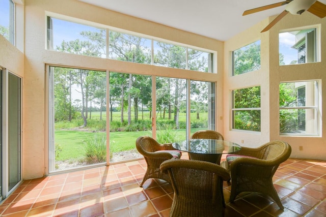 13312 NW Maplewood Rd, Palm City, FL 34990 - sunroom / solarium featuring a towering ceiling and tile patterned flooring