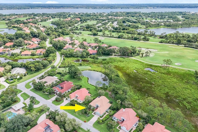 13312 NW Maplewood Rd, Palm City, FL 34990 - aerial perspective of suburban area featuring a nearby body of water and a golf club