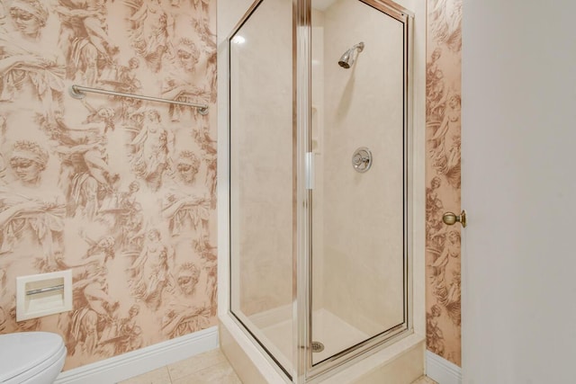13312 NW Maplewood Rd, Palm City, FL 34990 - bathroom featuring baseboards, a shower stall, toilet, and tile patterned flooring