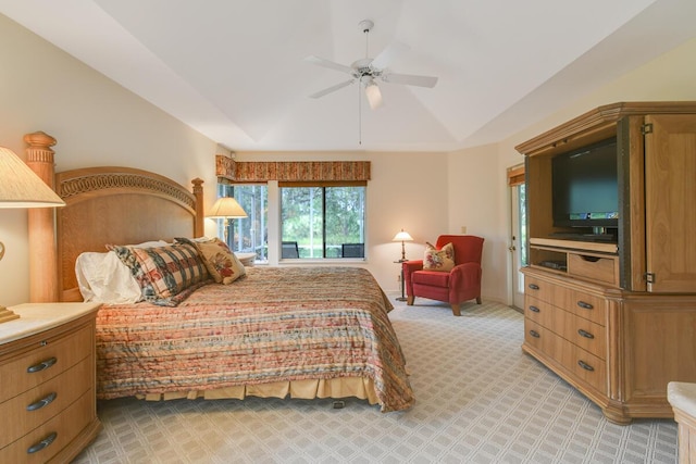 13312 NW Maplewood Rd, Palm City, FL 34990 - bedroom with vaulted ceiling, light carpet, and a ceiling fan