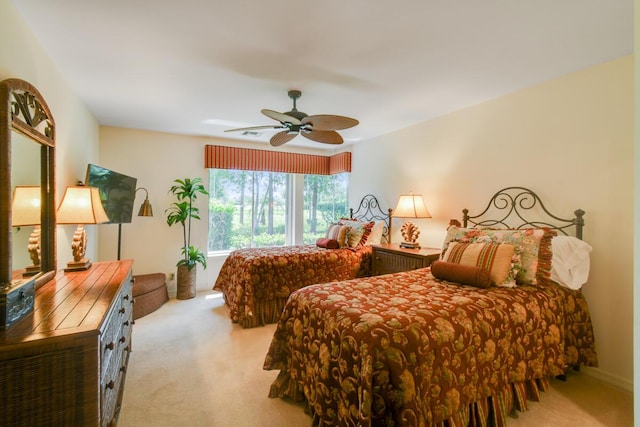 13312 NW Maplewood Rd, Palm City, FL 34990 - bedroom featuring carpet floors and a ceiling fan
