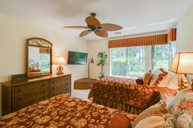 13312 NW Maplewood Rd, Palm City, FL 34990 - bedroom featuring carpet and ceiling fan