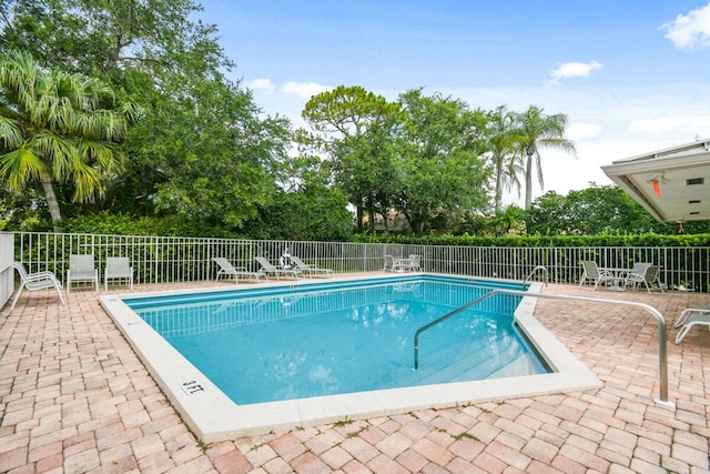 13312 NW Maplewood Rd, Palm City, FL 34990 - community pool with a patio area