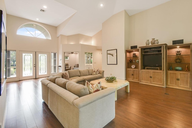 13312 NW Maplewood Rd, Palm City, FL 34990 - living area with high vaulted ceiling, dark wood finished floors, and a ceiling fan