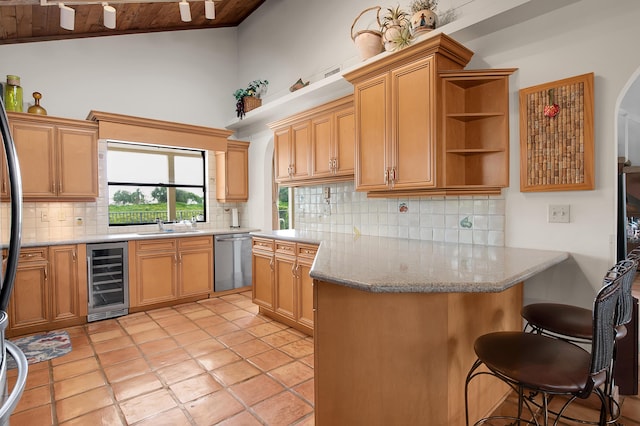 5898 Vista Linda Ln, Boca Raton, FL 33433 - kitchen with wine cooler, stainless steel dishwasher, a peninsula, wooden ceiling, and decorative backsplash