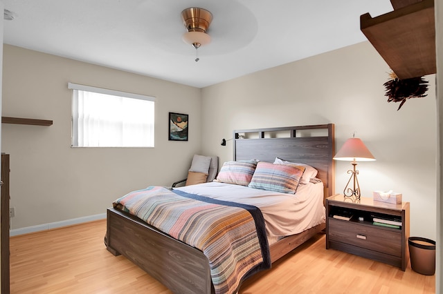 5898 Vista Linda Ln, Boca Raton, FL 33433 - bedroom with light wood finished floors, baseboards, and ceiling fan