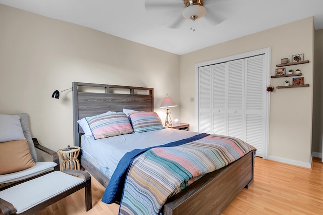 5898 Vista Linda Ln, Boca Raton, FL 33433 - bedroom featuring light wood-style floors, a closet, baseboards, and ceiling fan