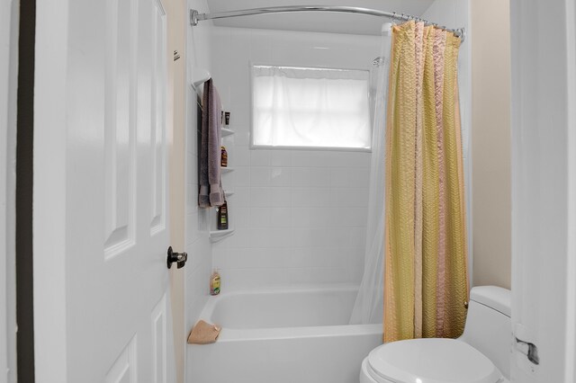 5898 Vista Linda Ln, Boca Raton, FL 33433 - bathroom featuring toilet and shower / bathtub combination with curtain