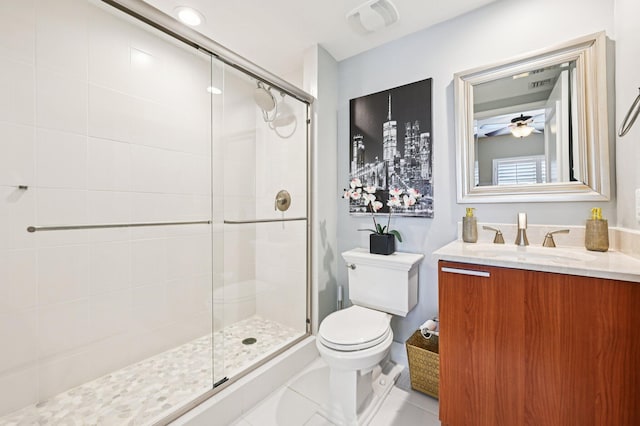 2640 Lake Shore Dr Unit 1510, Riviera Beach, FL 33404 - bathroom featuring toilet, a shower stall, vanity, and a ceiling fan