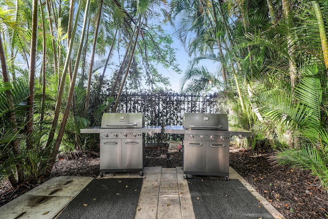2640 Lake Shore Dr Unit 1510, Riviera Beach, FL 33404 - view of patio / terrace featuring grilling area