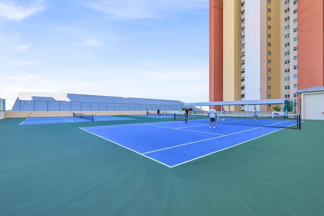 2640 Lake Shore Dr Unit 1510, Riviera Beach, FL 33404 - view of tennis court with community basketball court