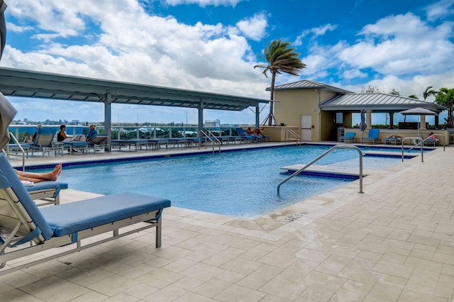 2640 Lake Shore Dr Unit 1510, Riviera Beach, FL 33404 - community pool featuring a gazebo and a patio area