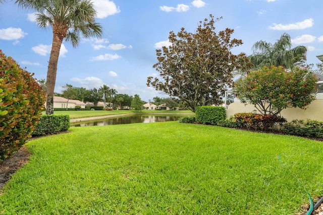 649 Hudson Bay Dr, Palm Beach Gardens, FL 33410 - view of green lawn with a water view