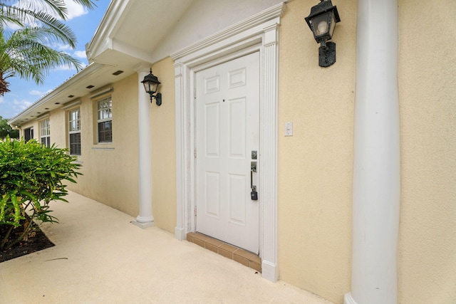 649 Hudson Bay Dr, Palm Beach Gardens, FL 33410 - entrance to property with stucco siding