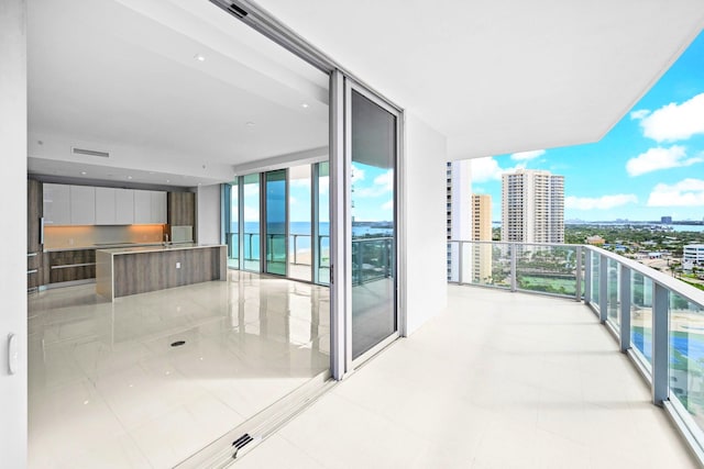 3100 N Ocean Dr Unit H-1708, Singer Island, FL 33404 - balcony featuring a view of city and an outdoor kitchen