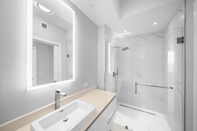 3100 N Ocean Dr Unit H-1708, Singer Island, FL 33404 - full bathroom featuring a marble finish shower, vanity, and recessed lighting
