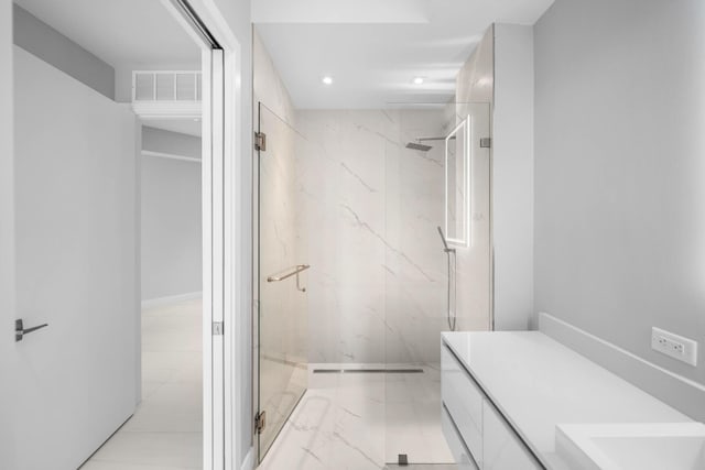 3100 N Ocean Dr Unit H-1708, Singer Island, FL 33404 - full bath with a marble finish shower, marble finish flooring, vanity, and recessed lighting