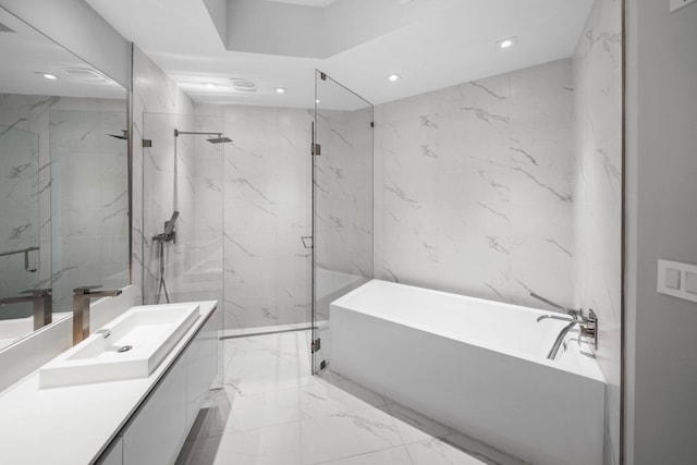 3100 N Ocean Dr Unit H-1708, Singer Island, FL 33404 - full bathroom with a freestanding bath, marble tiled floors, vanity, a marble finish shower, and recessed lighting