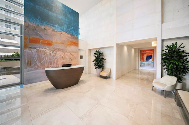 3100 N Ocean Dr Unit H-1708, Singer Island, FL 33404 - reception featuring a towering ceiling