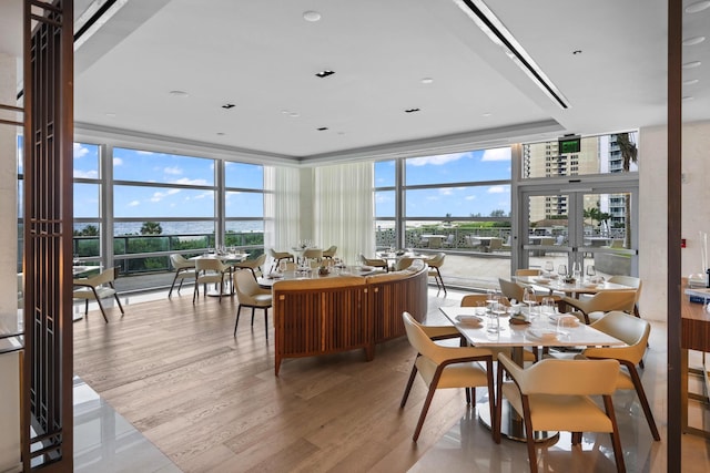 3100 N Ocean Dr Unit H-1708, Singer Island, FL 33404 - dining area with a wall of windows and wood finished floors