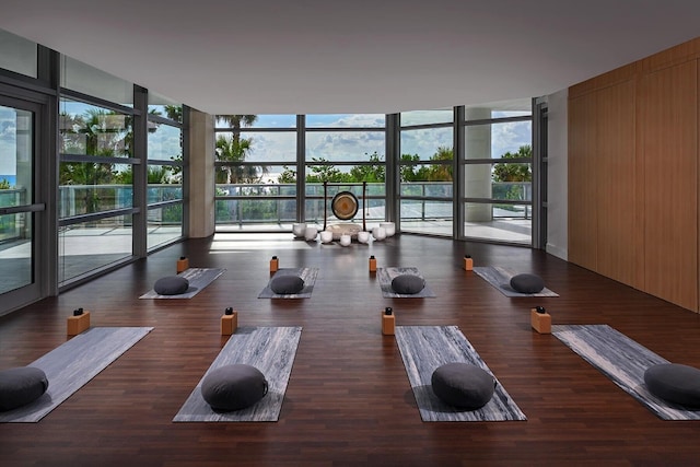 3100 N Ocean Dr Unit H-1708, Singer Island, FL 33404 - workout area featuring floor to ceiling windows and wood finished floors